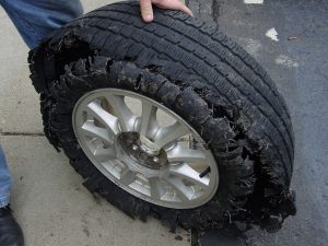 A blown out tire | Superior Kia