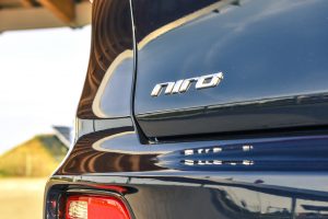 KIA niro close up view of emblem on the back of car