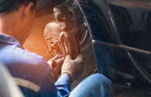 A car mechanic performing brake service near Orangeburg, South Carolina.