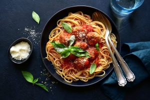 A plate of spaghetti and red sauce with meatballs taken at a restaurant near Orangeburg, South Carolina