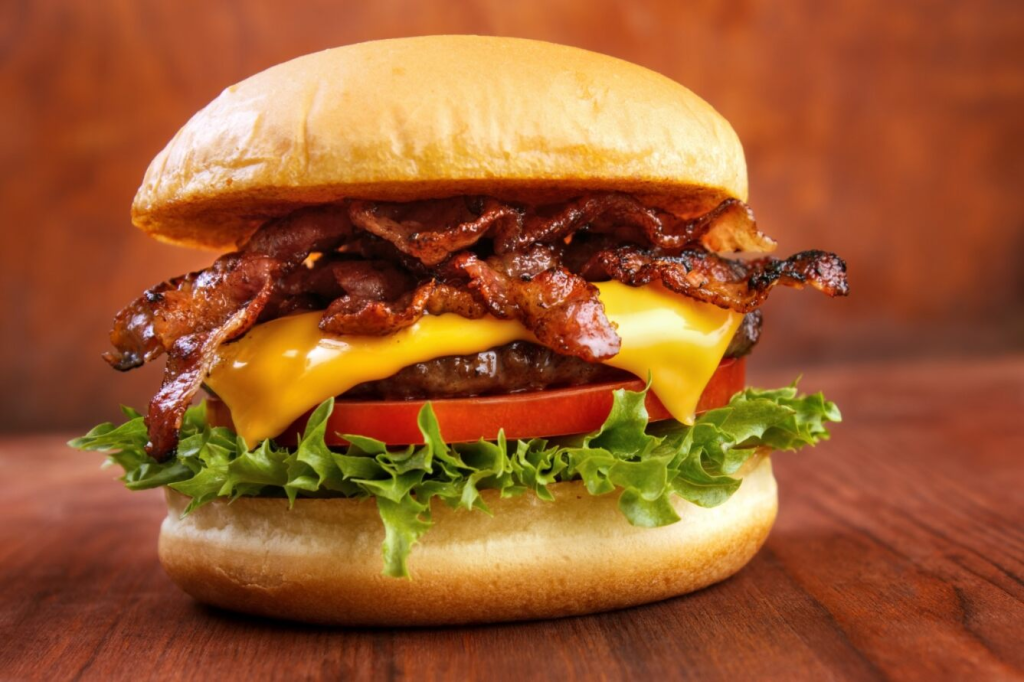 A burger with bacon on it, cooked at a barbecue restaurant near Orangeburg, South Carolina.