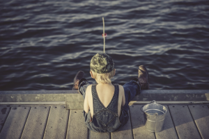 A child fishing off of a dock near Orangeburg, South Carolina.