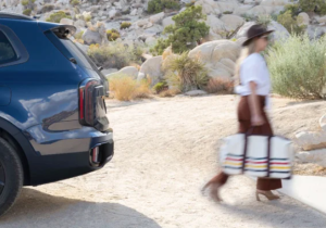 A woman taking a bag out of her 2024 Kia Telluride near Orangeburg, South Carolina