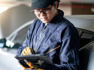 A service technician performing an inspection on a car near Orangeburg, South Carolina