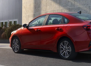 A 2024 Kia Forte parked on a city street near Orangeburg, South Carolina