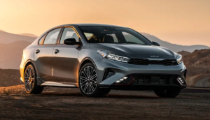 A 2024 Kia Forte photographed outdoors on a dirt road in the evening near Orangeburg, South Carolina