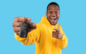 A person holding a set of keys to their new car near Orangeburg, South Carolina