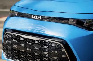 A blue 2024 Kia Soul parked outdoors near Orangeburg, South Carolina