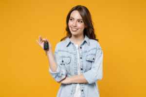A person showing off the keys to their new car purchased near Orangeburg, South Carolina